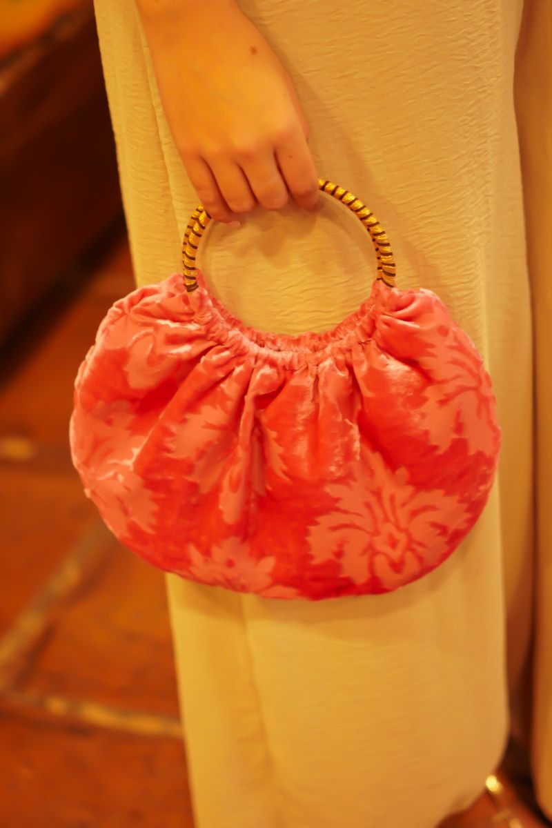 Cartera Rosa Bebe Aro Dorado